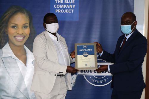 AfroCloud Technologies, Seniour Advisor, Patrick Mtange, receiving the Blue Company Certification from Executive Advisory Board Member of the Blue Company, Dr Julius Kipngetich