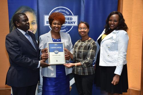 Sybyl Kenya ltd Manager Sunil Varghese, receiving the Blue Company Certification from Jubilee Holdings Regional CEO Dr. Julius Kipngetich, and UN Global Compact Network Kenya Country Coordinator Ms. Judy Njino. Caption 5 Lintons Beauty World CEO, Dr. Joyc