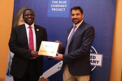 Gamewatchers Safaris CEO, Dr. Mohanjeet, receiving the Blue Company Certification from Jubilee Holdings CEO/ Executive Board Member of the Blue Company, Dr. Julius Kipngetich