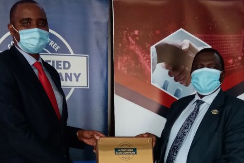 Smartron Limited Chief Executive Officer, Ronald Meru, receiving the Blue Company Certification from Executive Advisory Board Member of the Blue Company, Dr. Julius Kipngetich