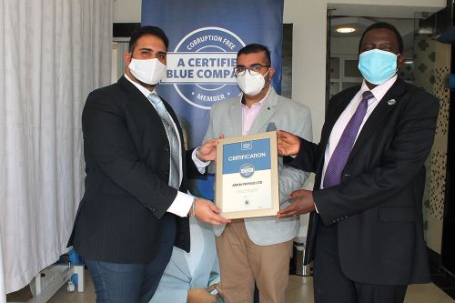 ARKN PHYSIO LTD Chief Executive Officer, Dr Aly Meghji , receiving the Blue Company Certification from Executive Advisory Board Member of the Blue Company, Dr. Julius Kipngetich