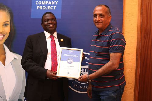 Autoskill Ltd Chief Executive Officer, Jitendra.R Khetia, receiving the Blue Company Certification from Executive Advisory Board Member of the Blue Company, Dr. Julius Kipngetich