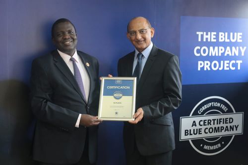 Go Places Managing Director, Mansoor Jiwani, receiving the Blue Company Certification receiving the Blue Company Certification from Executive Advisory Board Member of the Blue Company, Dr. Julius Kipngetich