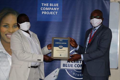 Laser Insurance Brokers, Executive Director, Jonathan Marucha, receiving the Blue Company Certification from Executive Advisory Board Member of the Blue Company, Dr Julius Kipngetich.