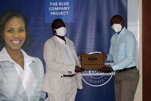 Rockwill Green Energy, Chief Executive Officer, Tonny Mutuku, receiving the Blue Company Certification from Executive Advisory Board Member of the Blue Company, Dr Julius Kipngetich