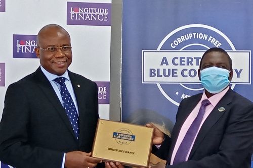Longitude Finance Chief Executive Officer, Michael Monari, receiving the Blue Company Certification from Executive Advisory Board Member of the Blue Company, Dr. Julius Kipngetich